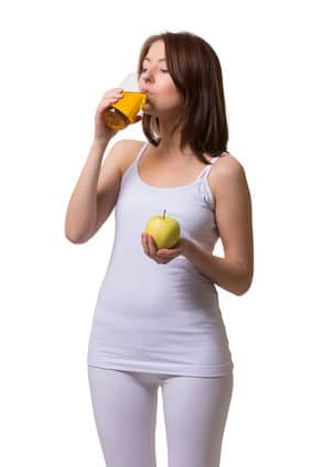woman drinks apple cider vinegar